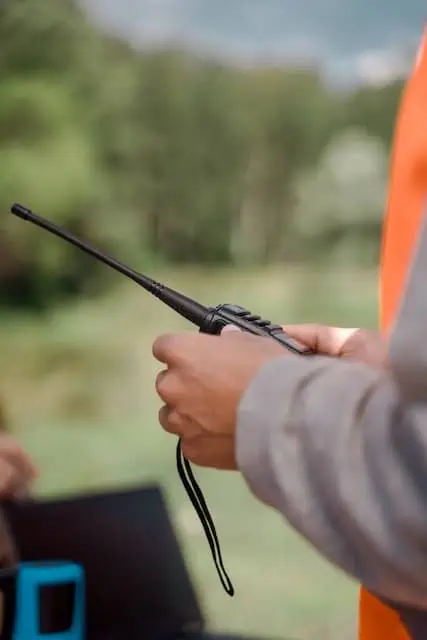 person holding a radio